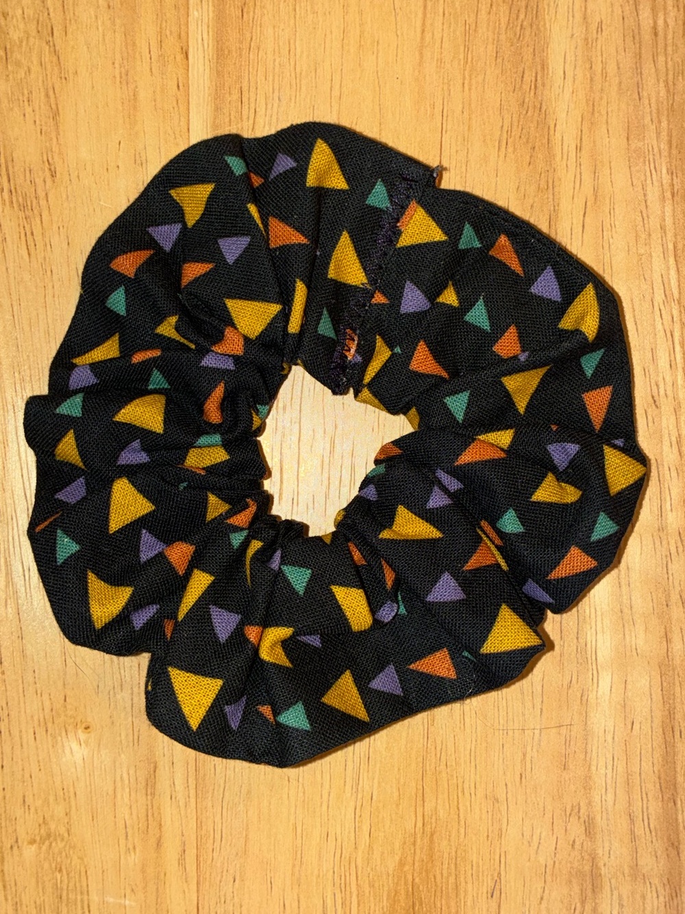 Hand Crafted Black Scrunchie with Yellow, Orange, Teal, and Purple Triangles
